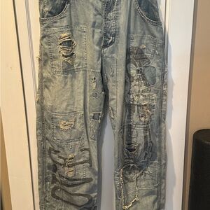 Distressed Blue Denim Jeans